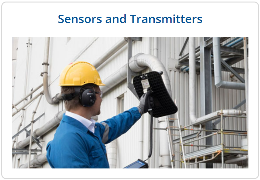 A man looking at a black sensor